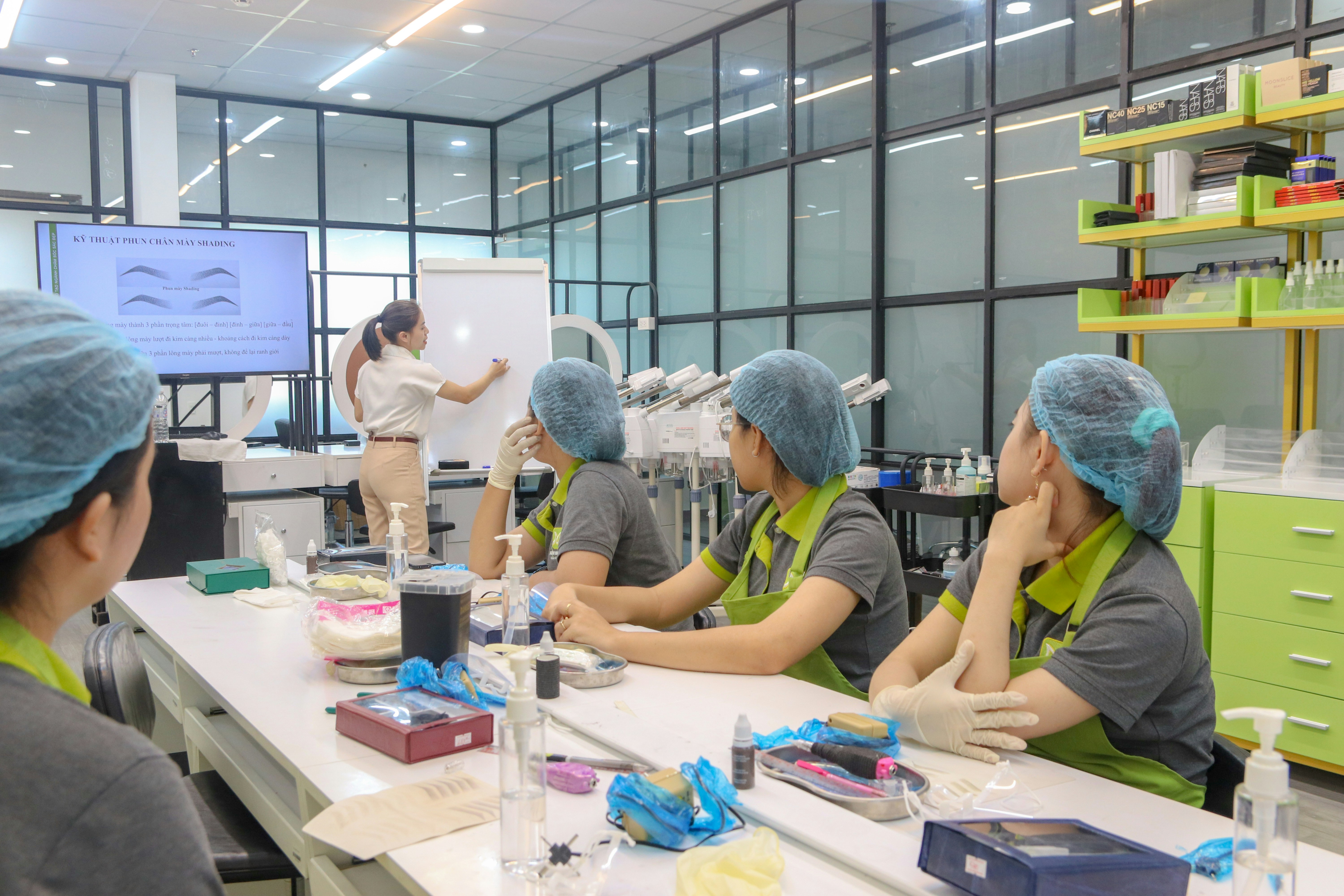 Hands using tools for detailed scientific or technical work