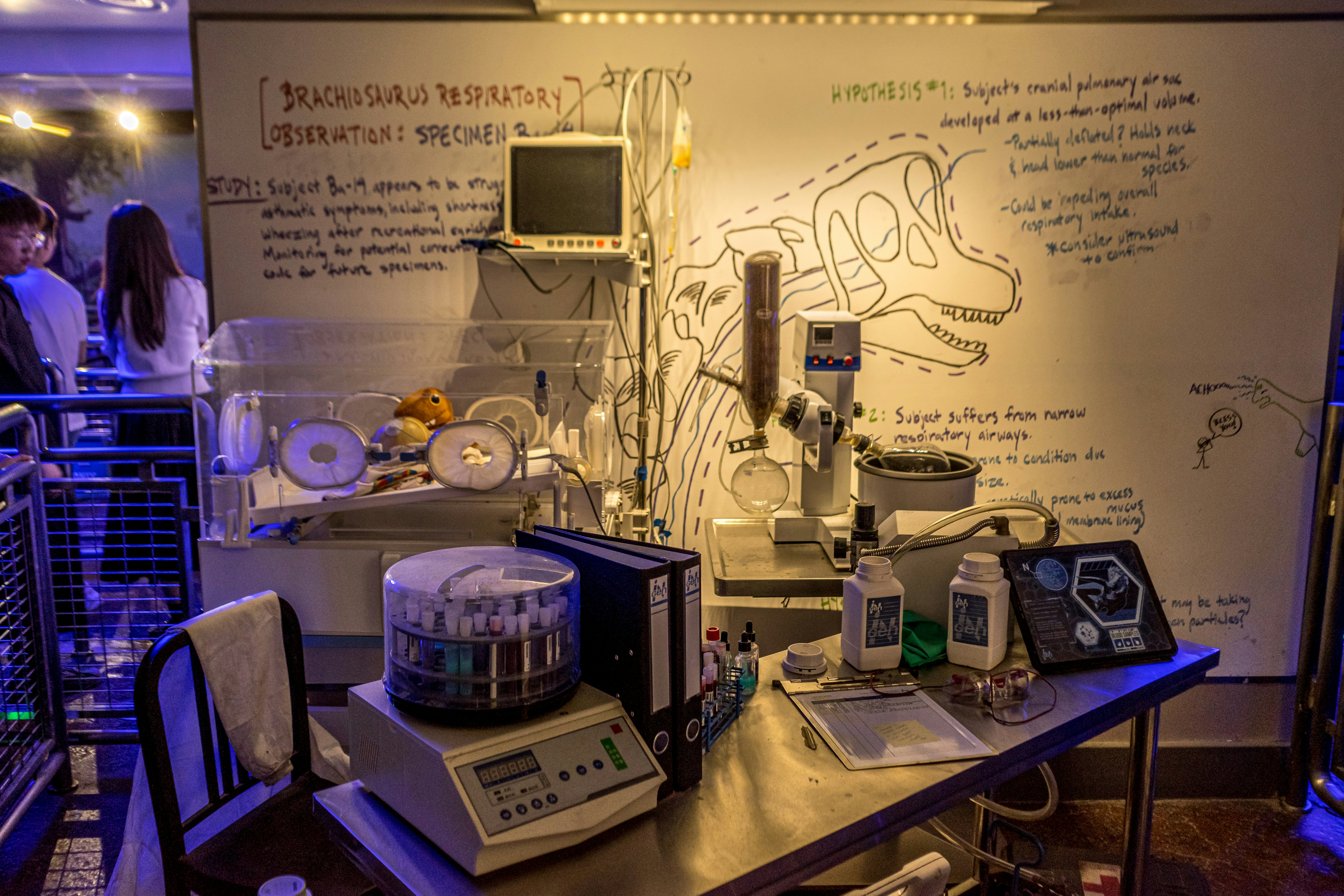 Researchers collaborating over documents in a lab environment